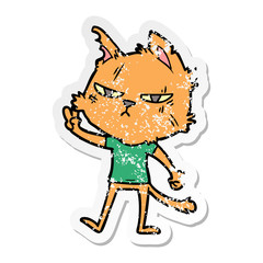 distressed sticker of a tough cartoon cat giving victory sign