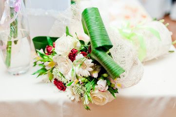 decoration of wedding table with flowers in a pot