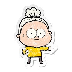 distressed sticker of a cartoon happy old woman