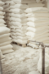 Sacks of flour in the bakery warehouse