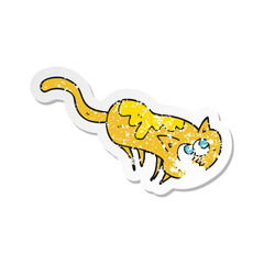 retro distressed sticker of a cartoon cat