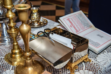 Fototapeta na wymiar Accessories of a priest for Christian baptism 