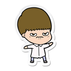 sticker of a annoyed cartoon boy