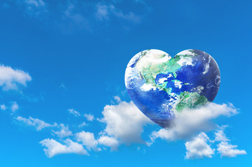 Earth in Heart shape on the white clound with blue sky, Love and Save the World for the Next Generation and Earth day concept, Elements of this image furnished by NASA