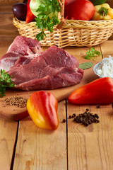 The process of cooking food - stuffed pepper with rice and meat and various spices.