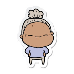 sticker of a cartoon peaceful old woman