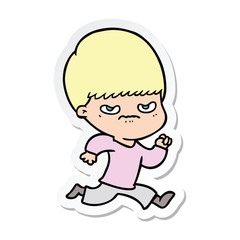 sticker of a annoyed cartoon boy