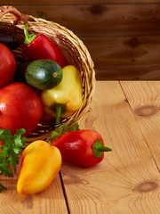 Gifts of golden autumn, red tomatoes, peppers, zucchini, eggplant - healthy food for a person,