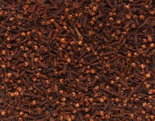 Cloves condiment texture, aromatic spice background closeup