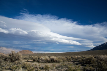 Fototapeta premium Wild cloud formations in the Alabama Hills