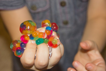 Antistress in the hands. Girl and anti-stress