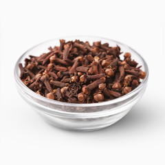 Heap of dried cloves isolated on white