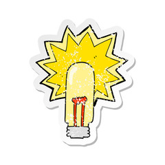 retro distressed sticker of a cartoon old light bulb