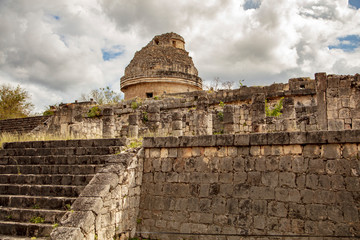 El Caracol or Observatory tower sits atop a rectangular stone platform withi the Maya Ruins of Chichen Itza complex