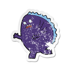 retro distressed sticker of a cartoon monster
