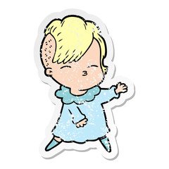distressed sticker of a cartoon squinting girl