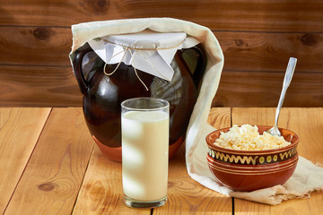 Dairy products - cottage cheese, milk, healthy food on the morning table.