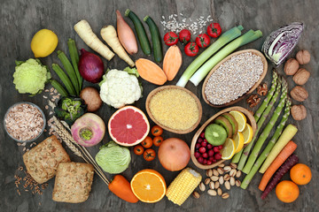 High fibre super food with grains, fruit, vegetables, whole grain bread rolls, seeds, nuts and cereals. Health foods high in antioxidants, omega 3, anthocyamnins, and vitamins.
