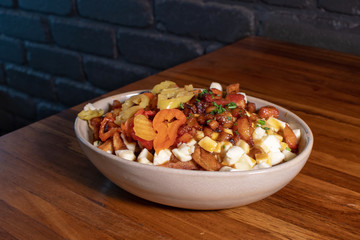 Poutine Quebec meal italian version with hot peppers