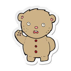 sticker of a cartoon unhappy teddy bear