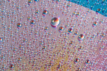water drops on dvd media, water drops on colorful background