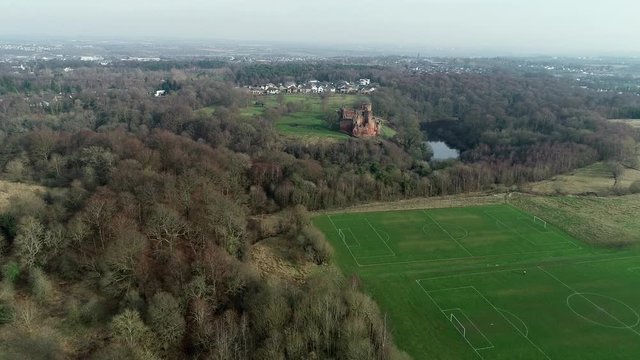 Aerial footage of Bothwell Castle near Uddingston in Scotland. Dramatic location by a winding curve in the River Clyde.