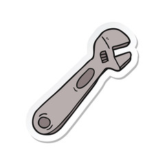 sticker of a cartoon spanner