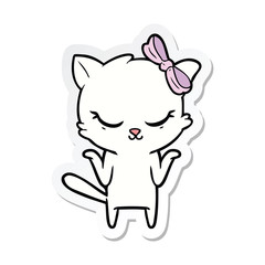 sticker of a cute cartoon cat with bow