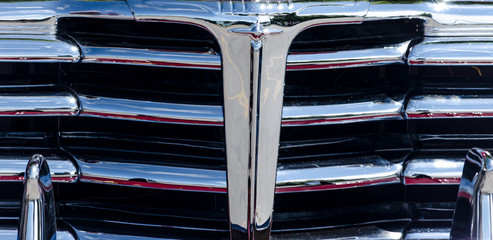 Close-up of a section of a classic car grill