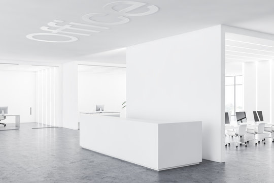 White reception desk in modern office