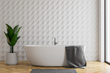 Naklejka na ściany i meble White tiled bathroom interior with tub