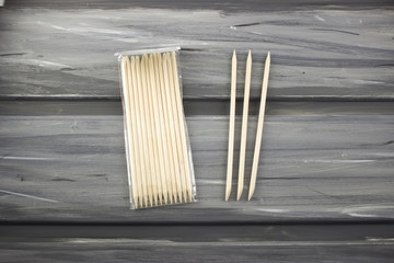 Orange wood stick cuticle pusher