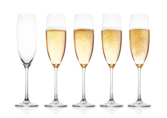 Elegant glasses of yellow champagne with bubbles