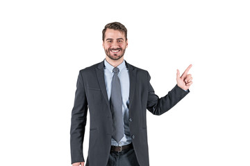 Smiling businessman pointing with finger, isolated
