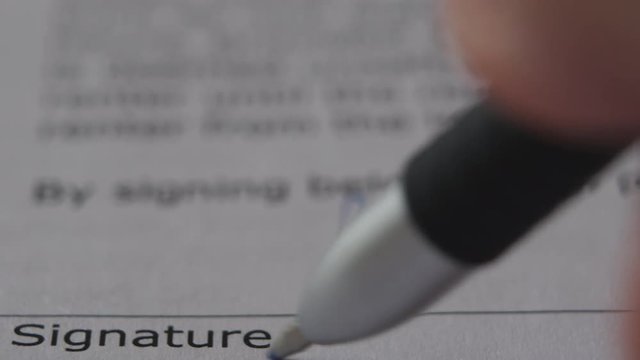 The Man Signs The Document With His Signature. Slider Shot. Fake signature. Fake Document. 