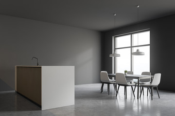 Gray kitchen corner with bar and table