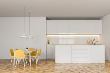 Modern white kitchen with table