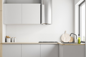 White kitchen interior with countertops
