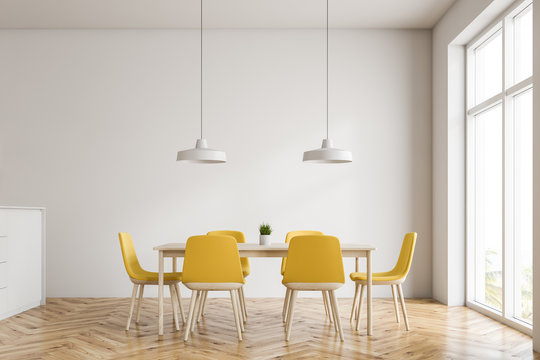 Minimalistic white dining room