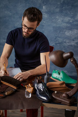 guy attending design school, close up photo. man preparing the report for boss at work