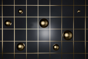 Gold spheres over black tile background