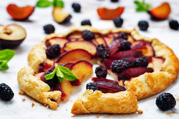 Plum blackberry galette with fresh blackberries and plum slices
