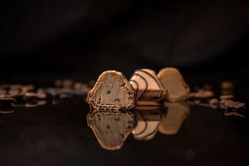 candies chocolate filled (cream filling). food background. top view