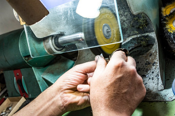 hands of jewelry technician
