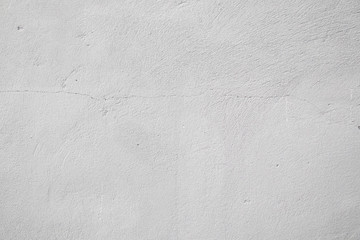 Obraz premium White wall fragment with scratches and cracks 