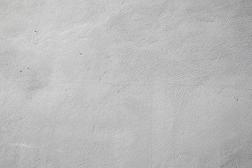 Naklejka premium White wall fragment with scratches and cracks 