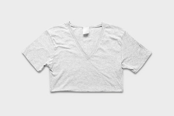 Blank White T-Shirts Mock-up on soft gray background, front  view. Ready to replace your design.High resolution photo.
