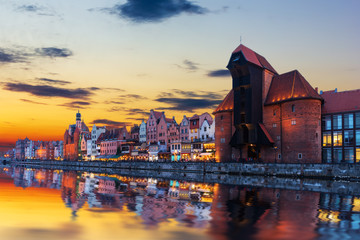 Fototapeta na wymiar Gdansk sunset above the Motlawa and Zuraw Port Crane, Poland