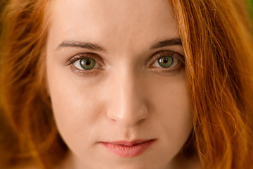 Obraz premium Portrait of young redhead woman with perfect skin