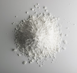 White Powder of Concrete, Clay or Bentonite on Light Background